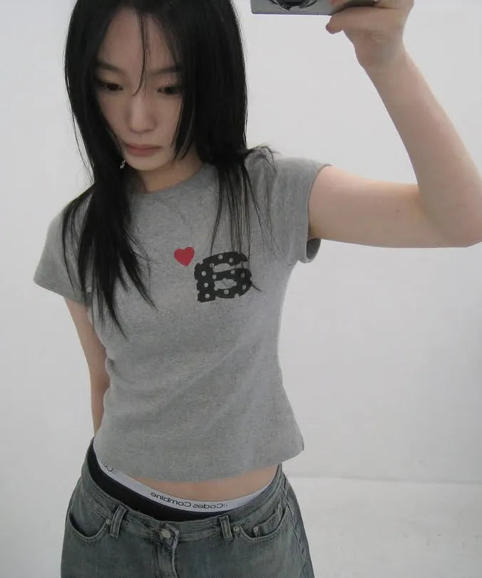 aeae - DOT SMALL LETTER TEE