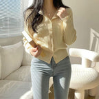 The colors are perfect! Fruit-patterned round neck cable knit cardigan 